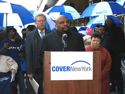 cover-ny-umbrella-news-conf.jpg