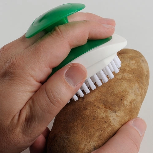 In Use - Promotional Palm Vegetable Brush